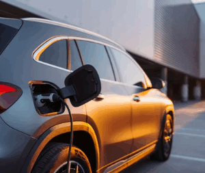defis-electrification-flotte-entreprise.webp Véhicule électrique en charge sur un parking d’entreprise, illustrant les défis liés à l’électrification d’une flotte automobile.